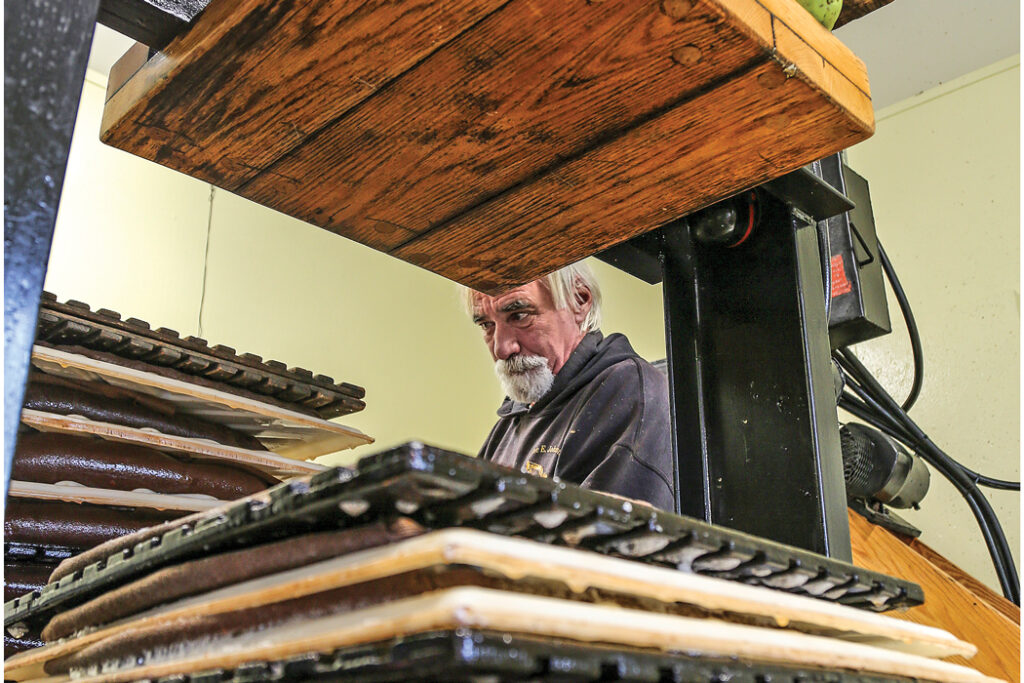 Bob Sewall pressing cider