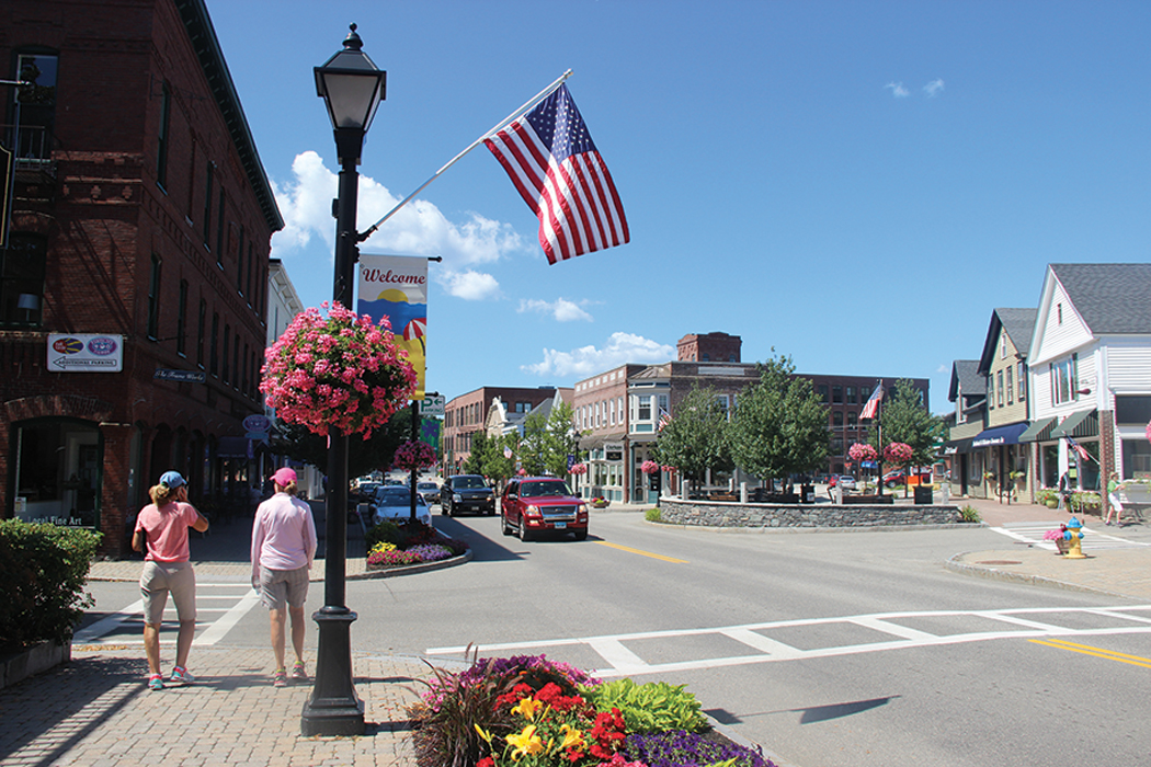 Flowers line Main Street in downtown Kennebunk