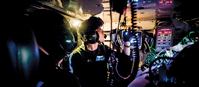 Life Flight nurse checks vital signs